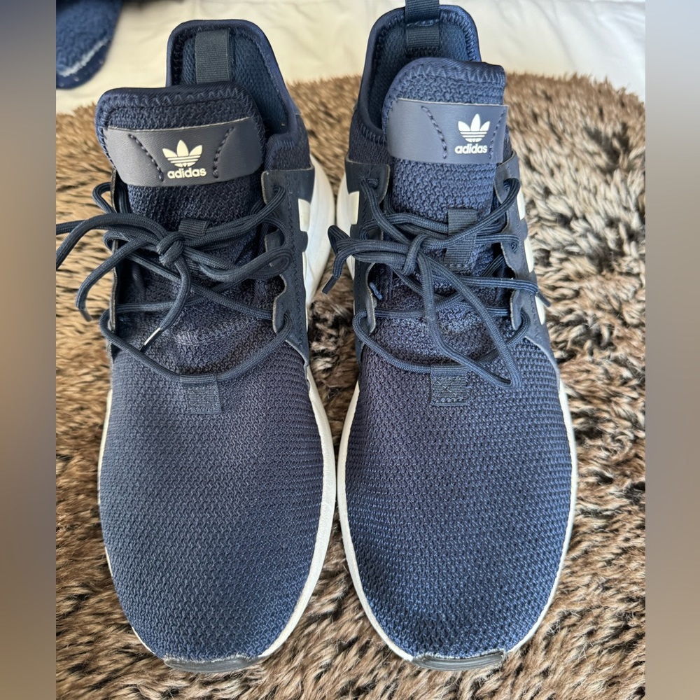 Navy blue adidas sneakers